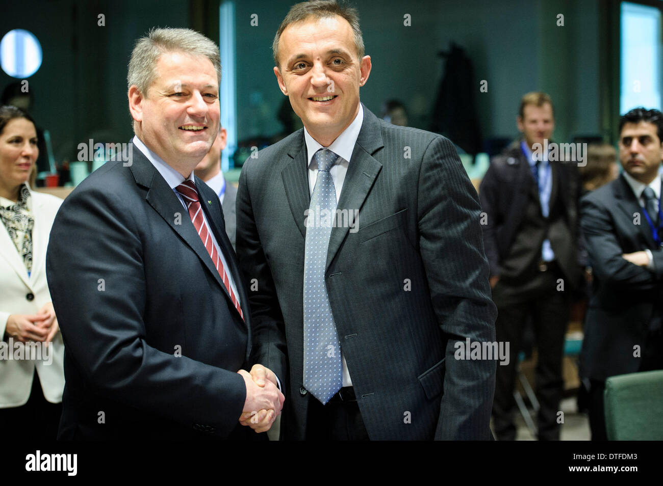 Brussels, Bxl, Belgium. 17th Feb, 2014. Croatian Agriculture Minister Tihomir Jakovina (R ) and Austrian minister for Agriculture, Forestry, Environment, & Water Management AndrÅ Rupprechter at the start of Agricuture and Fisheries Council at the EU Headquarters in Brussels,  As regards agriculture, the Commission will brief the Council about its proposal for a regulation as regards the aid scheme for the supply of fruit and vegetables and milk in schools. Ministers will also discuss on the situation of the EU milk sector as a follow-up of the discussion in the Dece Stock Photo