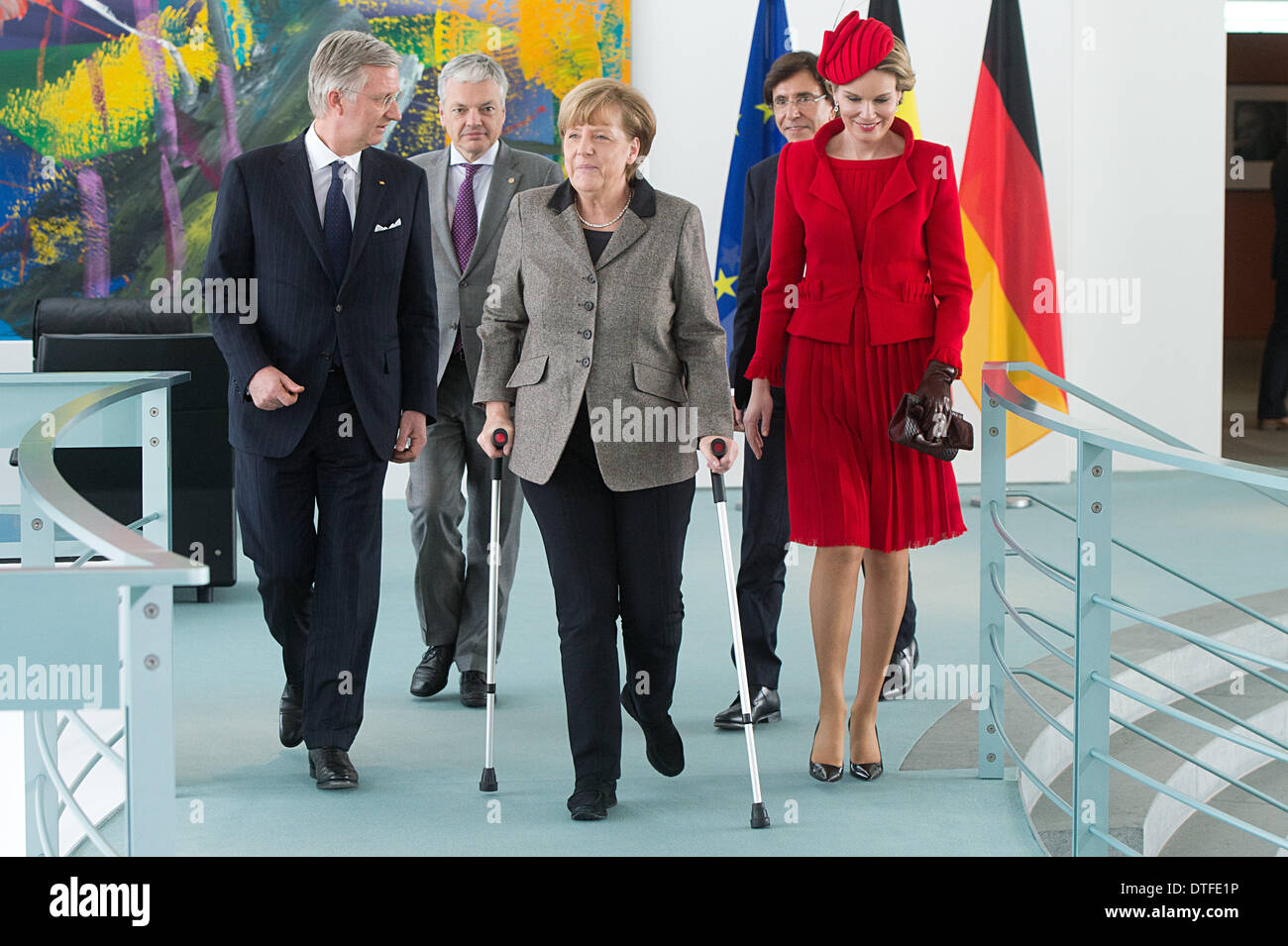 Berlin, Germany. 17th Feb, 2014. Belgium King Philippe (L) and his wife Queen Mathilde (R), Belgium Prime Minister Elio Di Rupo (2-R) and Belgium Foreign Mininster Didier Reynders (2-L) are welcomed by German Chancellor Angela Merkel (CDU, C) during Philippes's inaugutal visit in Berlin, Germany, 17 February 2014. It is King Philippe's first visit of Germany after he succeeded his father Albert II as King of the Belgians in July 2013. Photo: Maurizio Gambarini/dpa/Alamy Live News Stock Photo