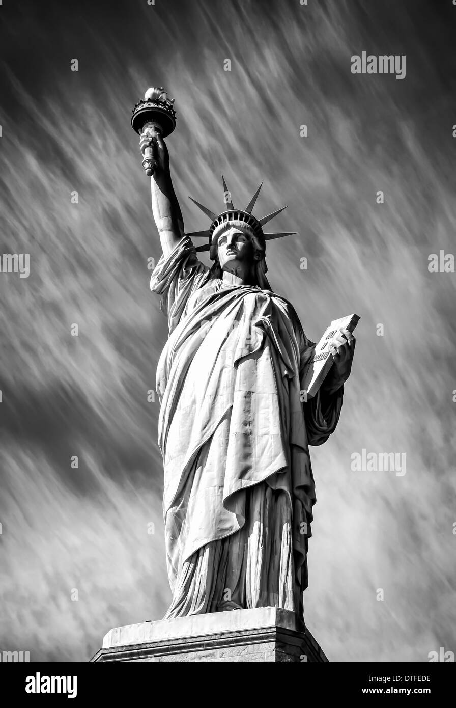 Statue of Liberty with striking cloud formation, NY USA Stock Photo