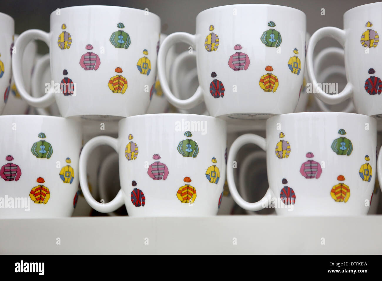 Ascot, United Kingdom, cups with racing outfit designs Stock Photo