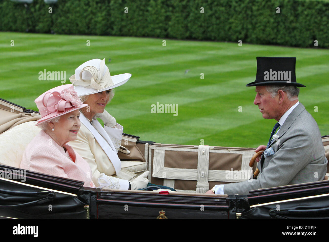 Ascot, United Kingdom, Queen Elizabeth II, Camilla and Prince Charles sitting in a carriage Stock Photo