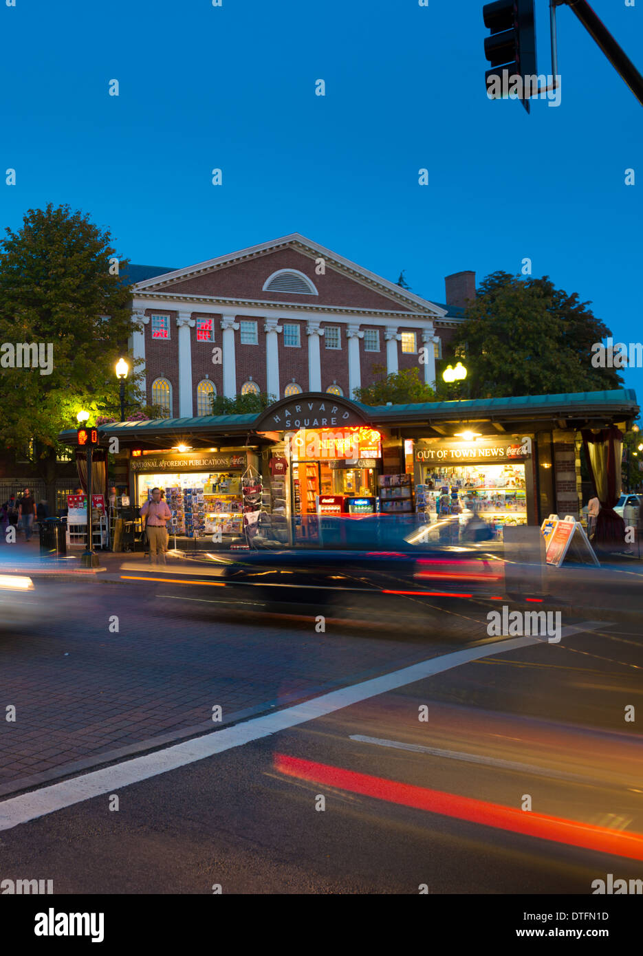 Harvard Square at night with light streaks and cars, Boston Stock Photo
