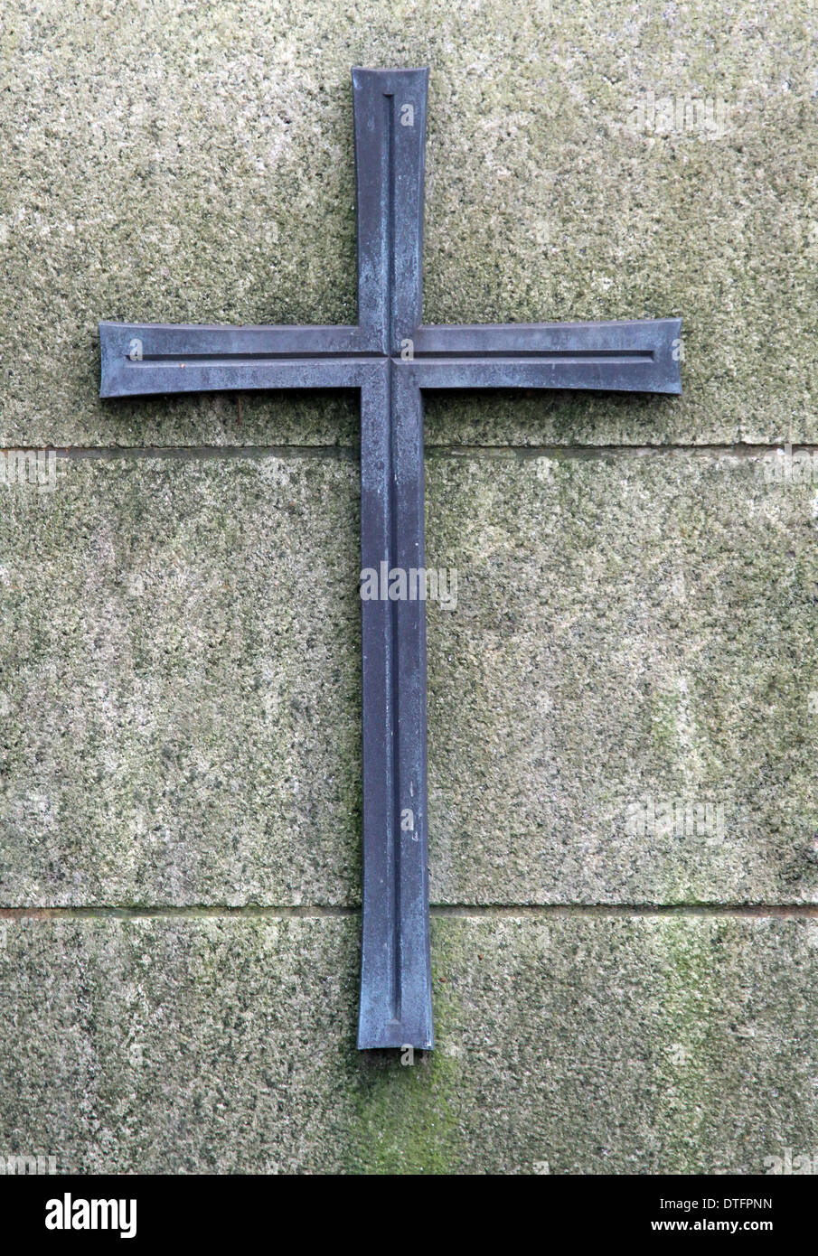 Berlin, Germany, cross on a grave stone Stock Photo