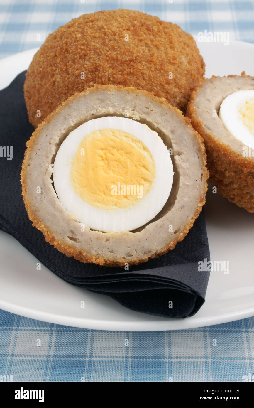 Scotch eggs a hard boiled egg wrapped in pork sausage meat and