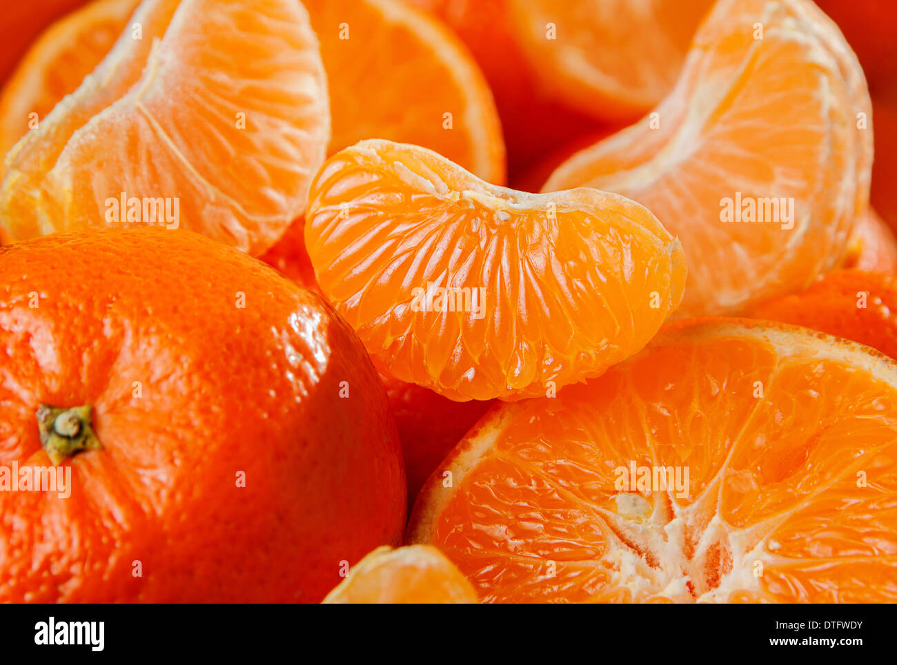 Sweet tangerine fruit closeup background Stock Photo