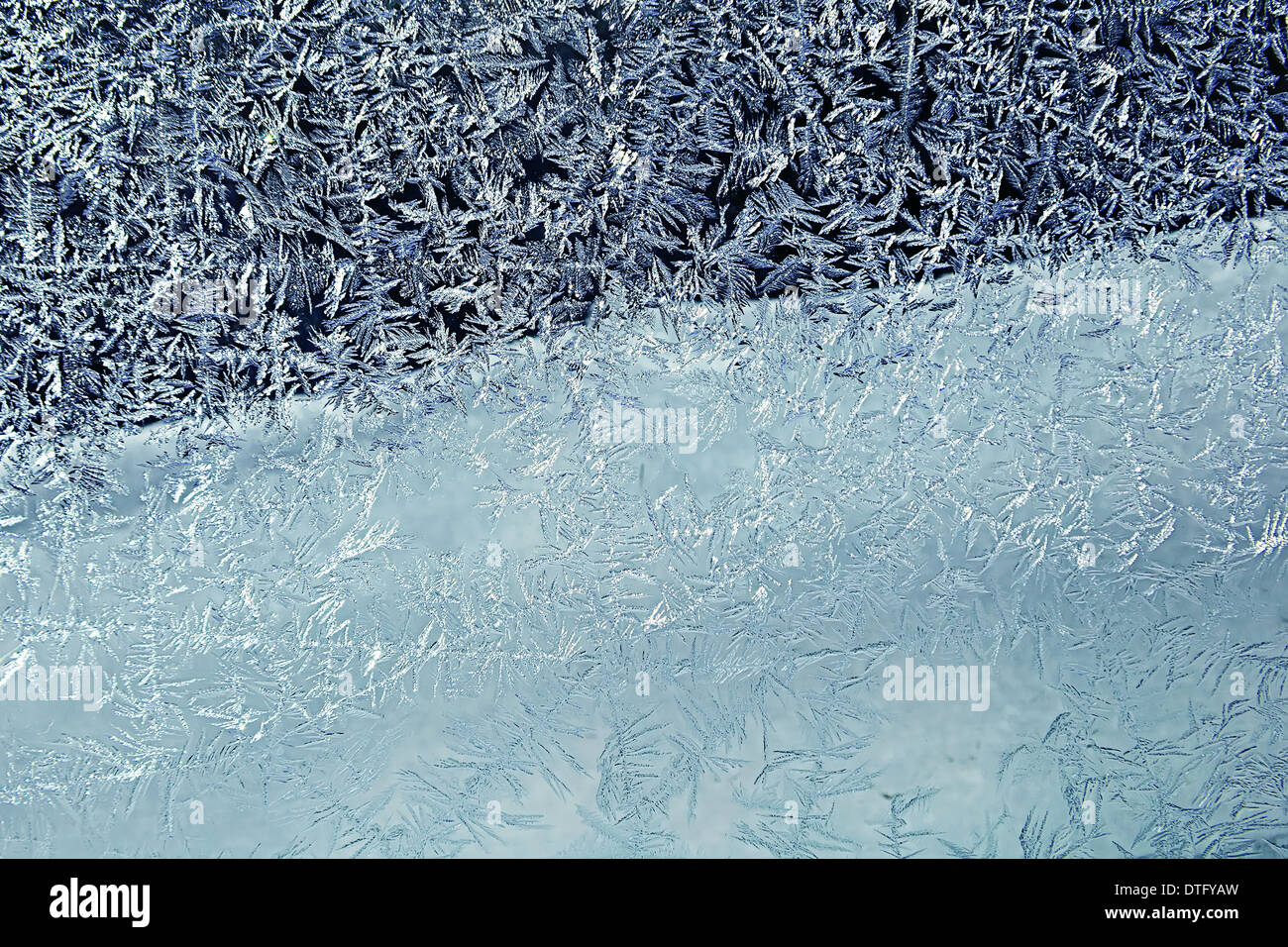 Icy pattern closeup in blue colors Stock Photo
