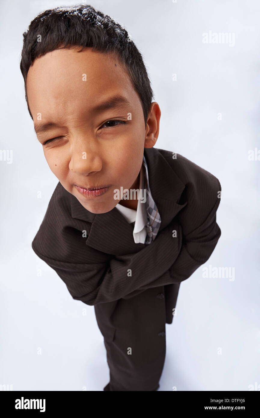 Boy in big suit hires stock photography and images Alamy