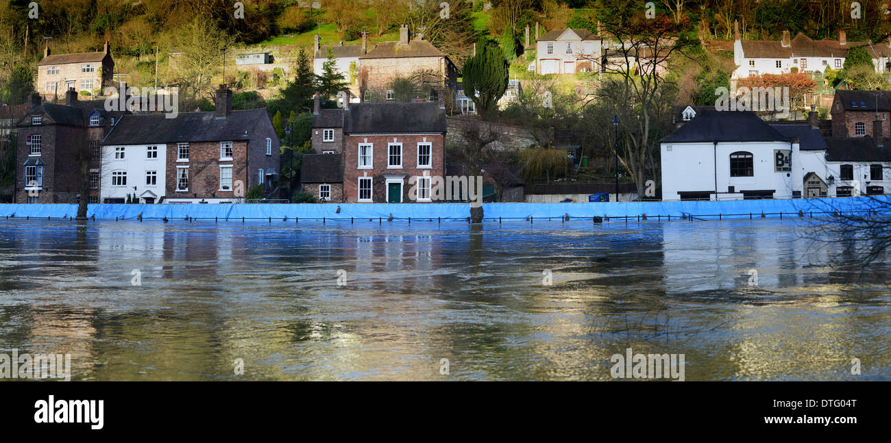 Environment Agency flood barriers protect properties from the River Severn on the Wharfage in Ironbridge. Stock Photo