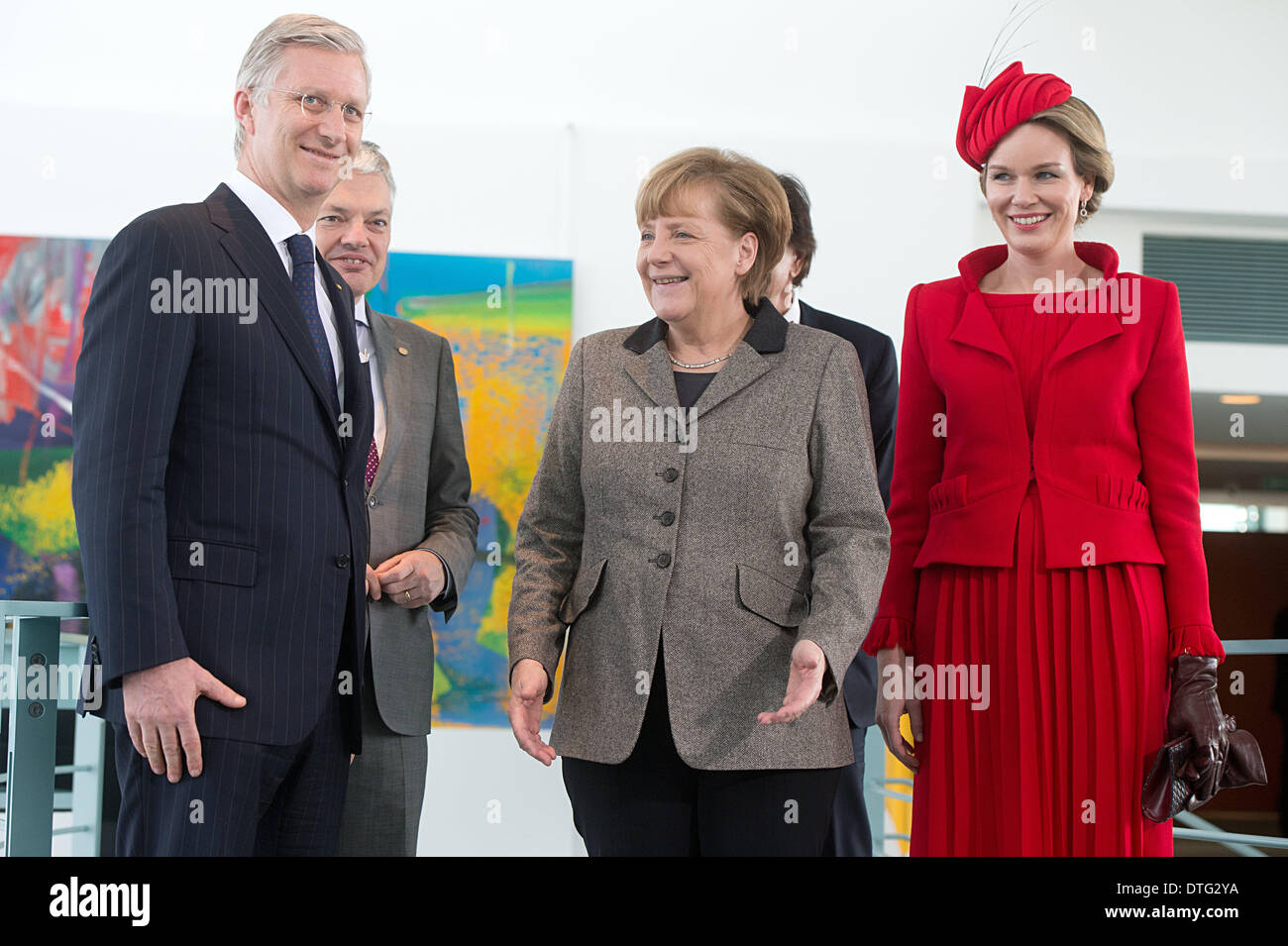 Berlin, Germany. 17th Feb, 2014.  Belgium King Philippe (L), his wife Queen Mathilde (R), Belgium Prime Minister Elio Di Rupo (COVERED) and Belgium Foreign Minister Didier Reynders (2-L) are welcomed by German Chancellor Angela Merkel (CDU, C) at the Federal Chancellery in Berlin, Germany, 17 February 2014. It is the first visit to Germany of the Belgium monarch since he ascended to the trhone in Juli 2013. Credit:  dpa picture alliance/Alamy Live News Stock Photo