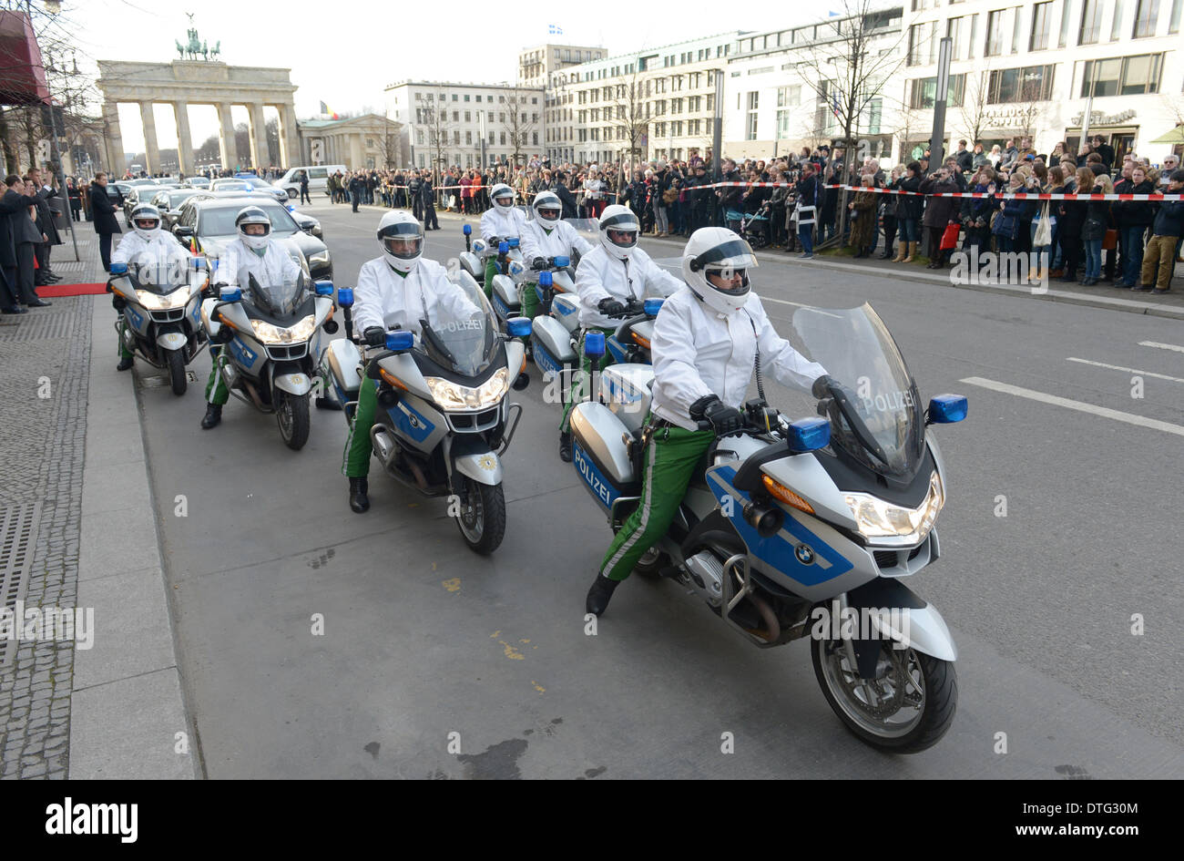 Berlin Germany 17th Feb 2014 The Motorcycle Escort Fot He Belgian Royal Couple Leads The Motorcade In Front Of Brandenburg Gate In Berlin Germany Berlin Germany 17th Feb 2014 The Motorcycle Escort Fot He Belgian Royal Couple Leads The Motorcade In Front Of Brandenburg Gate In Berlin Germany