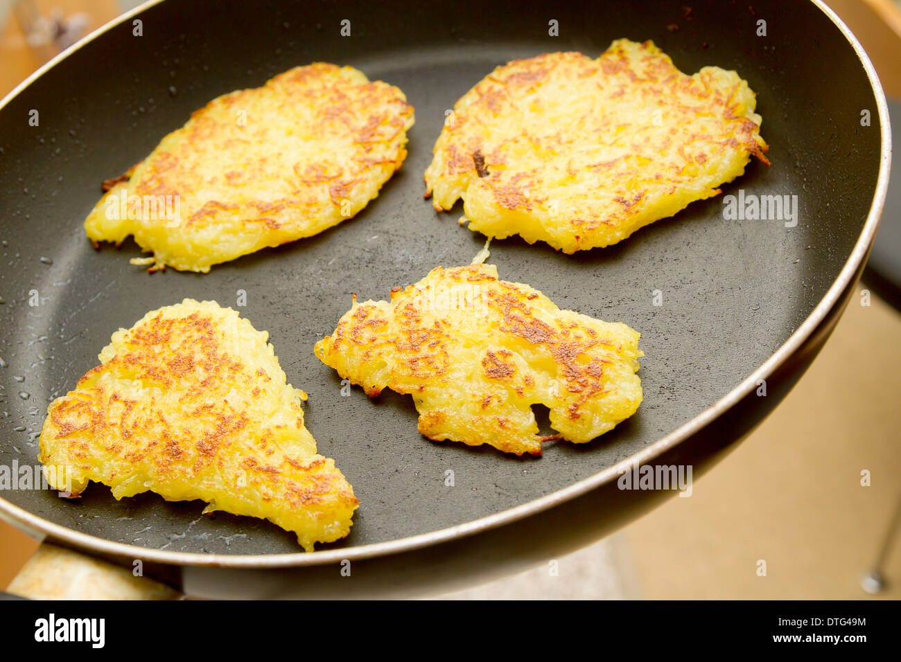 potato fritter in a pan Stock Photo