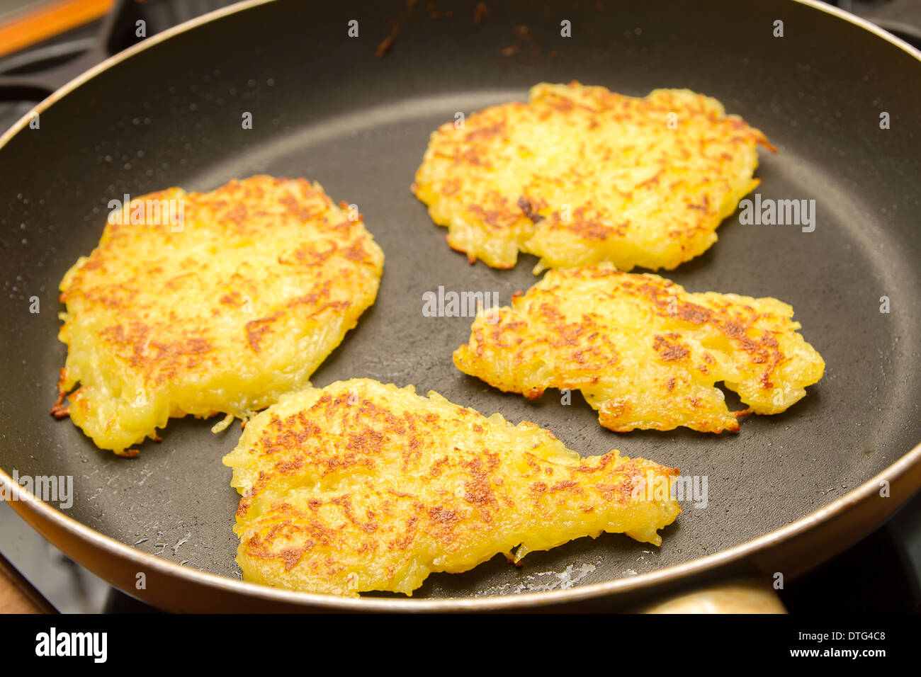 potato fritter in a pan Stock Photo