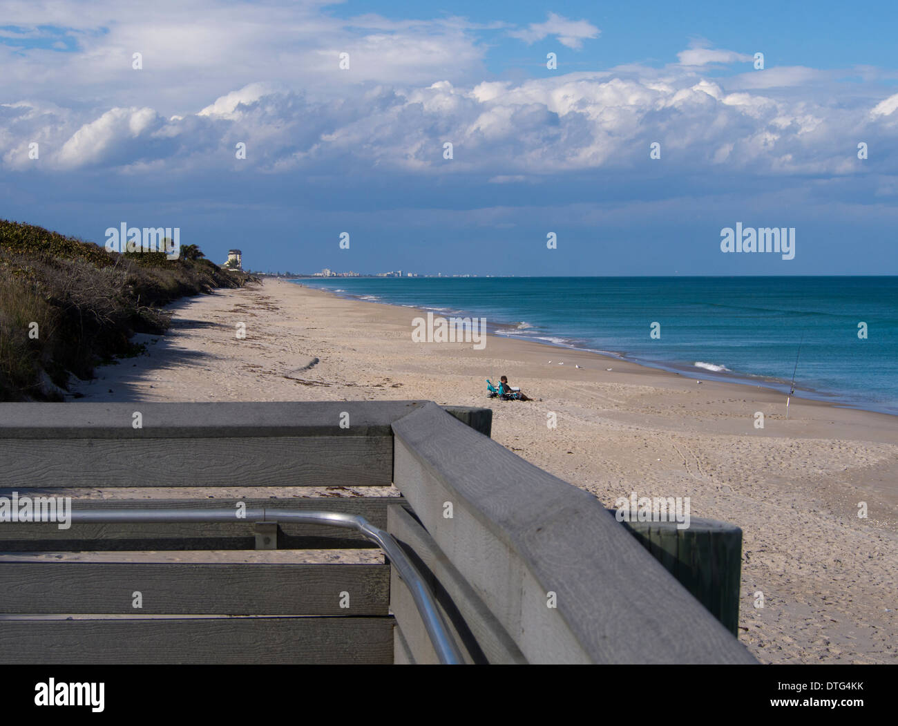 Surf fishing from the boardwalk at Melbourne Beach in Florida on the