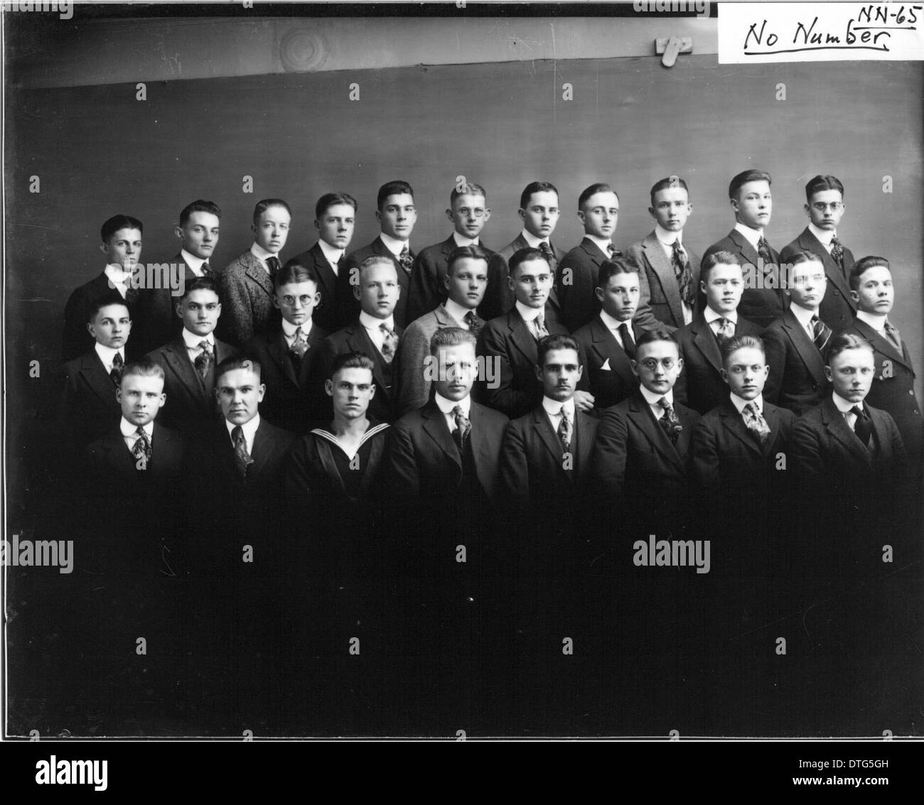 A Historical Photograph Showing A Large Group Of Men Dressed In Formal a-historical-photograph-showing-a-large-group-of-men-dressed-in-formal