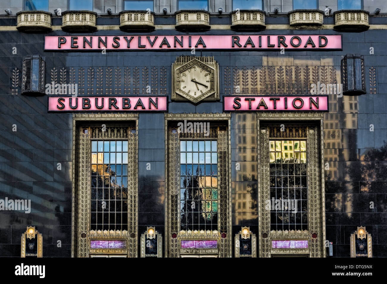 The art deco facade of the Pennsylvania Railroad Suburban Station in the late afternoon. Stock Photo