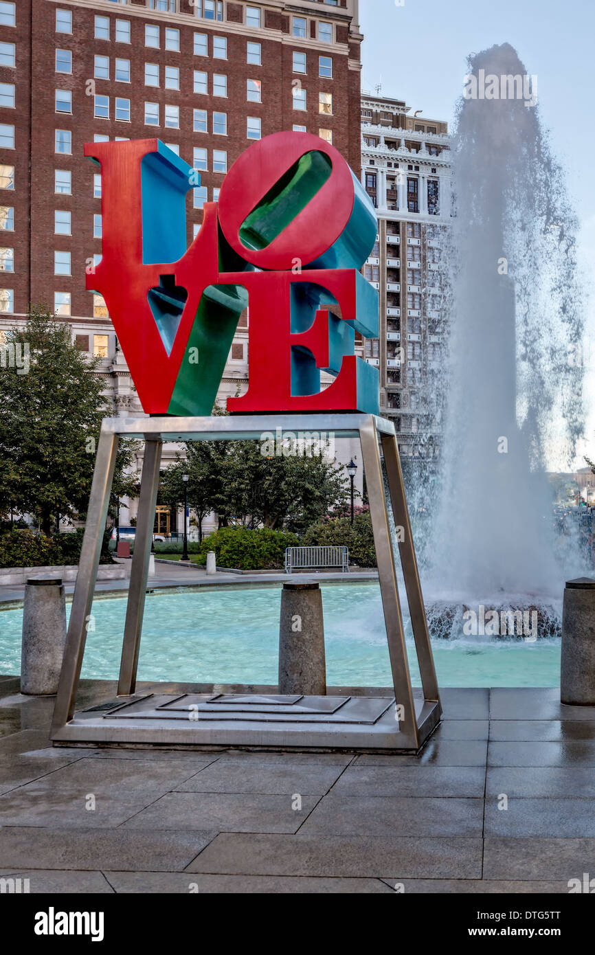 Love sign and water fountain at the Love Park officially named the John F. Kennedy Plaza located in Center City, Pennsylvania. The park is dedicated to the late United States president John F. Kennedy. Stock Photo