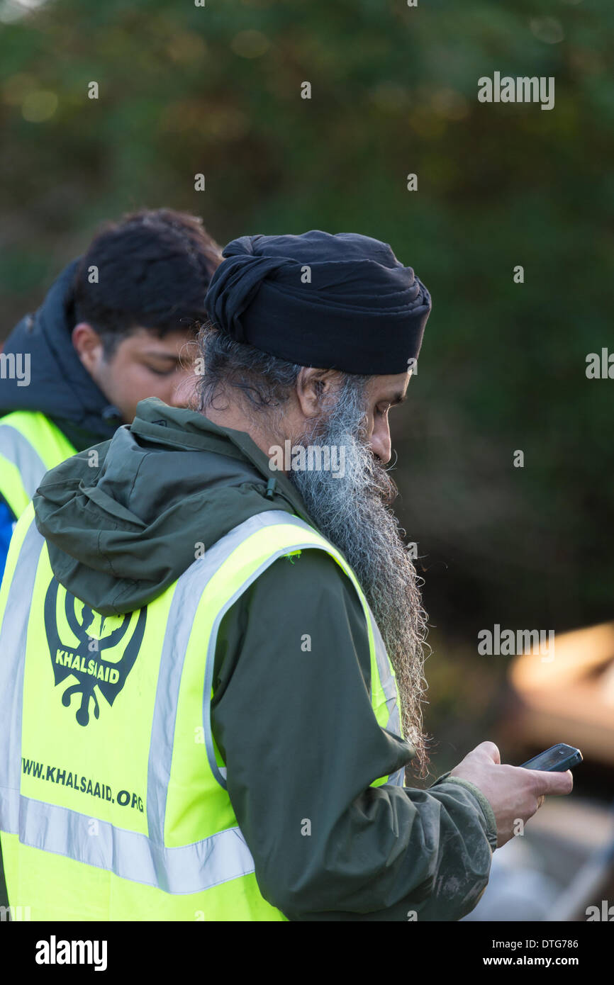Burrowbridge, Somerset, United Kingdom at 16:40 hrs on 16th February.  Volunteers at Khalsa Aid have come to Burrowbridge to help with flood relief work. Stock Photo