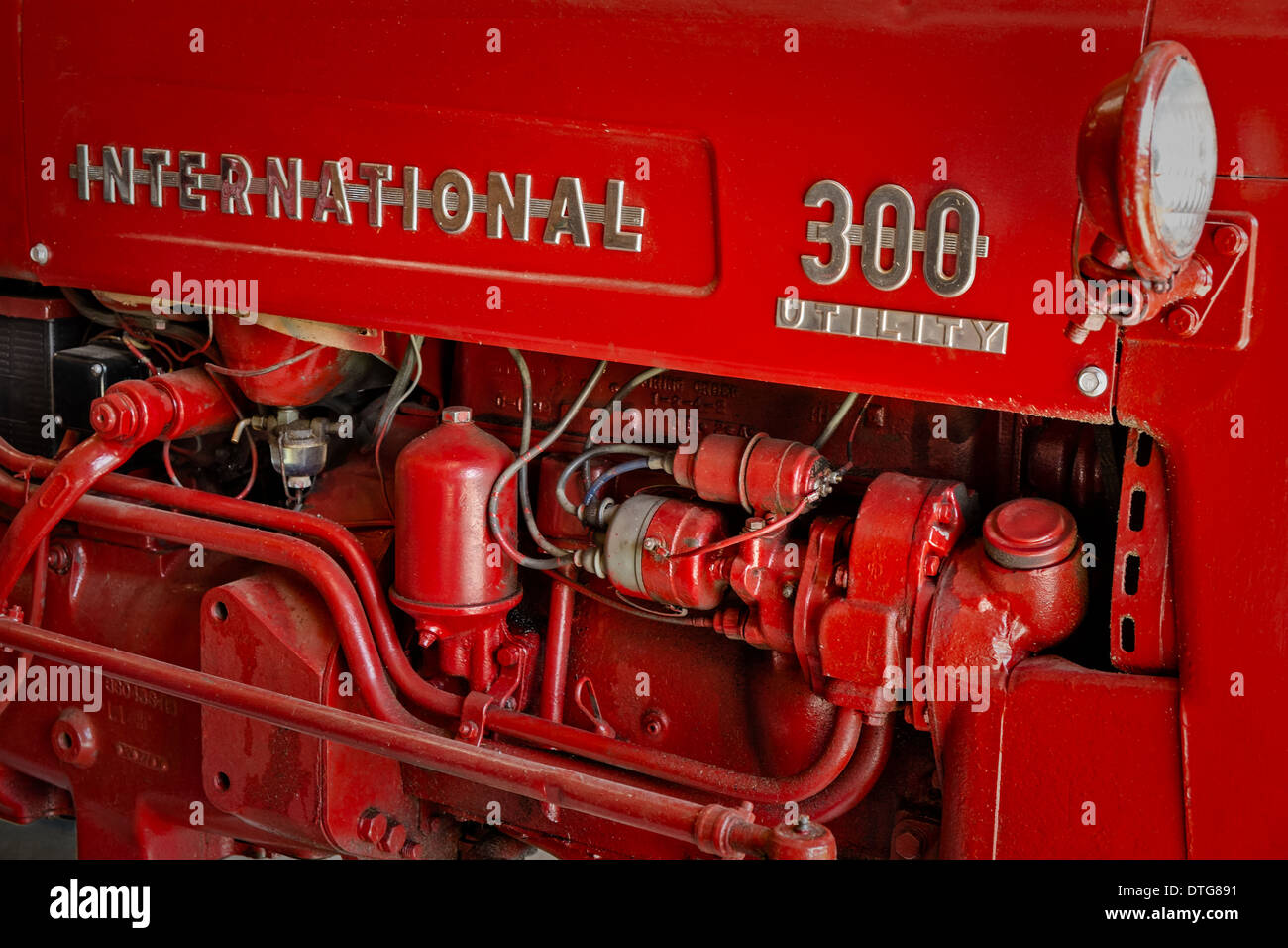 Detail view of a 1950's International 300 Utility harvester tractor. Stock Photo