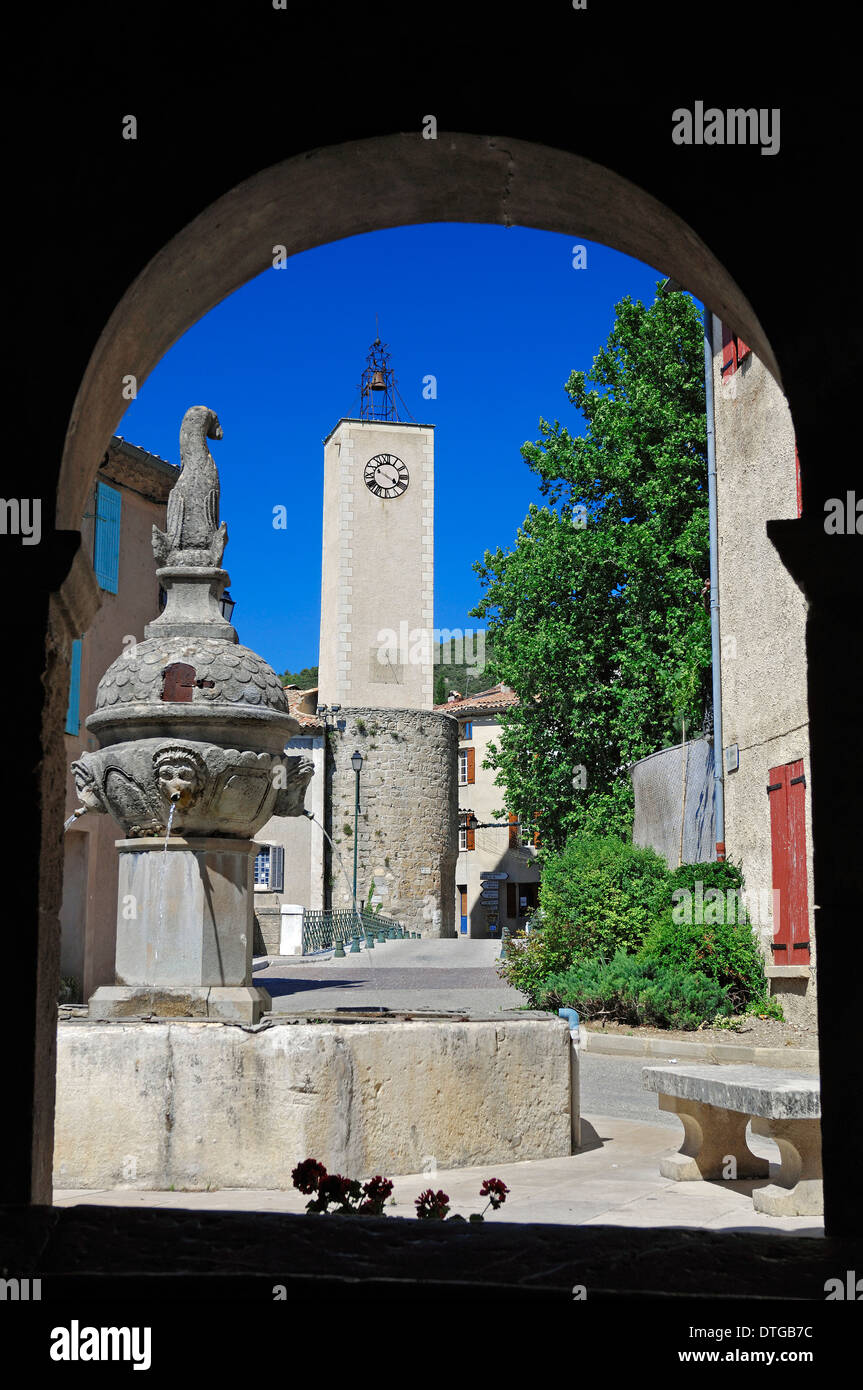 Fountain and belltower, Mollans sur Ouveze, Vaucluse, Provence-Alpes-Cote d'Azur, Southern France Stock Photo