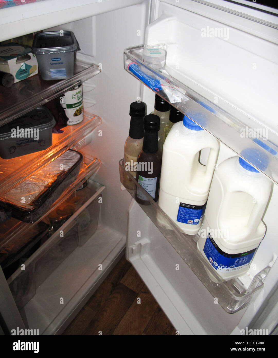 Open fridge door milk dairy hi-res stock photography and images - Alamy