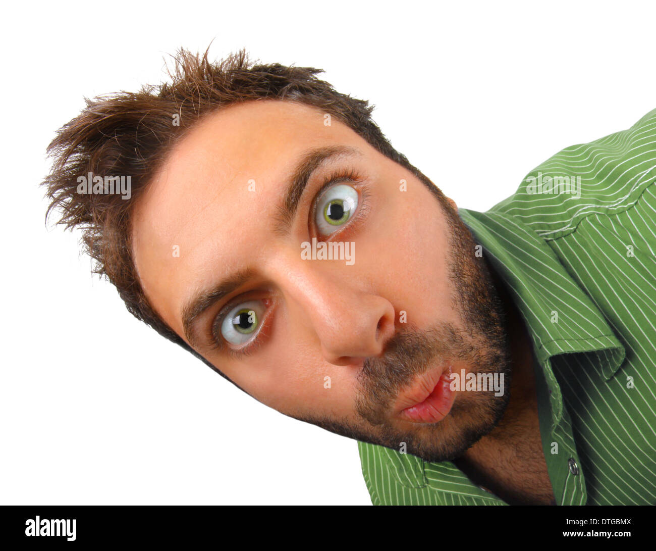 Boy with green shirt with surprised expression WOW. Stock Photo