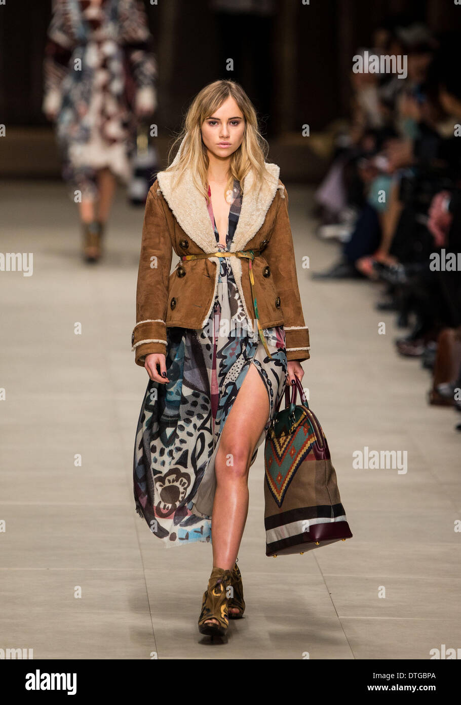 London, Britain. 17th Feb, 2014. A model presents a creation from the Burberry Prorsum Autumn/Winter 2014 collection during London Fashion Week in London, Britain, on Feb. 17, 2014. Credit:  Tang Shi/Xinhua/Alamy Live News Stock Photo