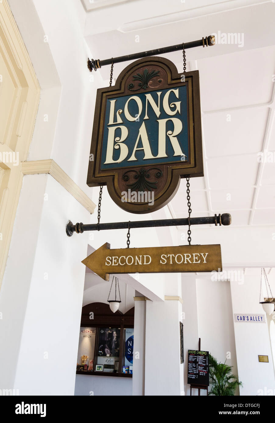 The Long Bar sign outside the historic Raffles Hotel, Singapore Stock Photo