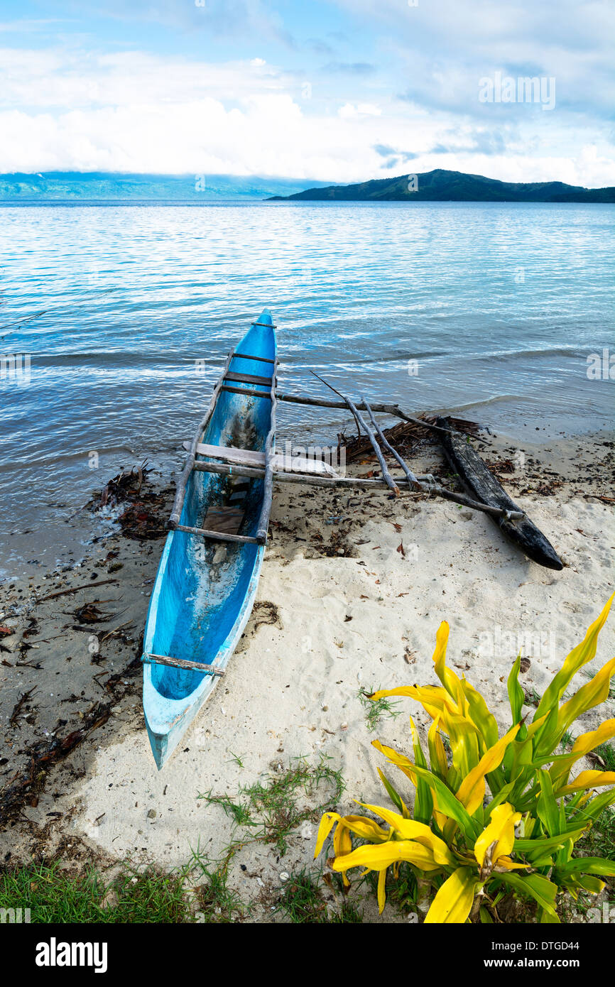 A traditional Polynesian outrigger on the island of Kioa in Fiji is still used as transportation. Stock Photo