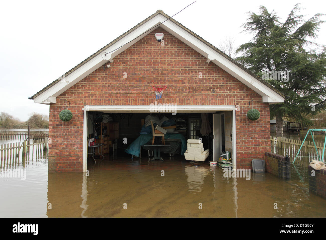 Ham Island, Thames Valley, UK.  Flooded garage. Stock Photo