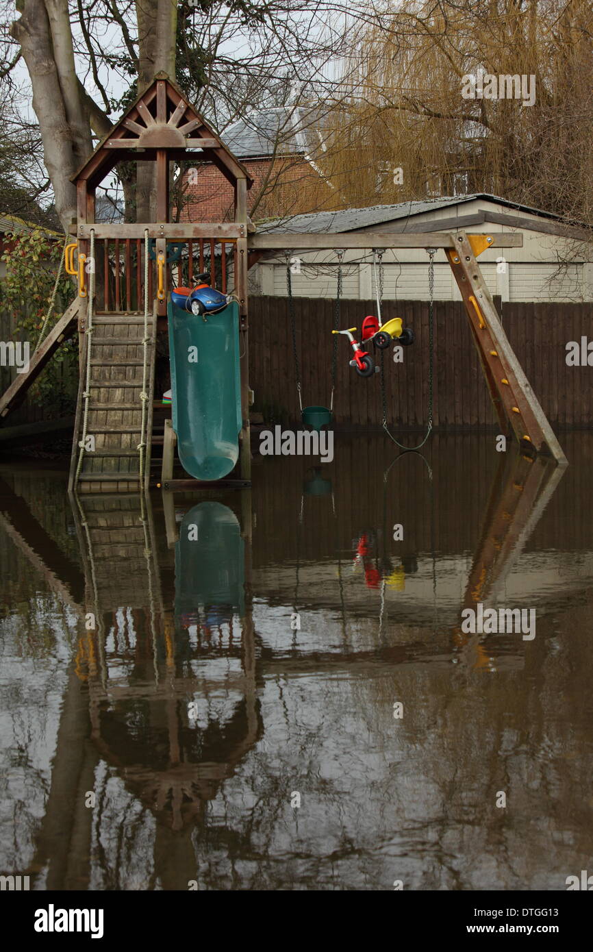 Ham Island, Thames Valley, UK.  Flood waters surround a children's playground. Stock Photo