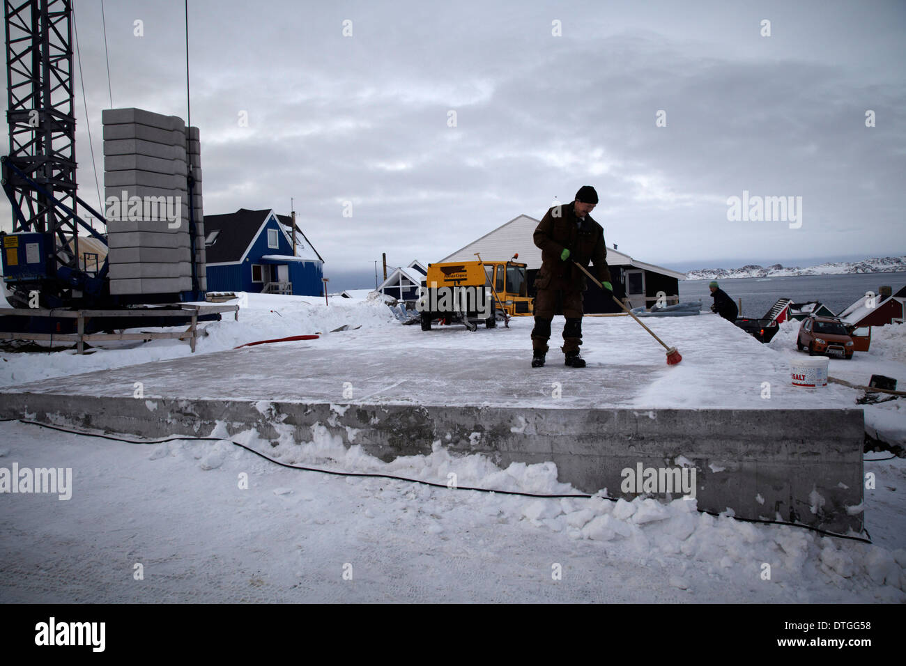 A craftsman prepares a settlement in Greenland's capital Nuuk. Stock Photo