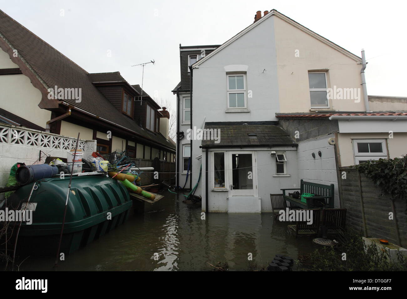 Chertsey, Thames Valley, UK . 17th Feb, 2014. Flooded rear garden with water up to the back door. of house Credit:  Zute Lightfoot/Alamy Live News Stock Photo