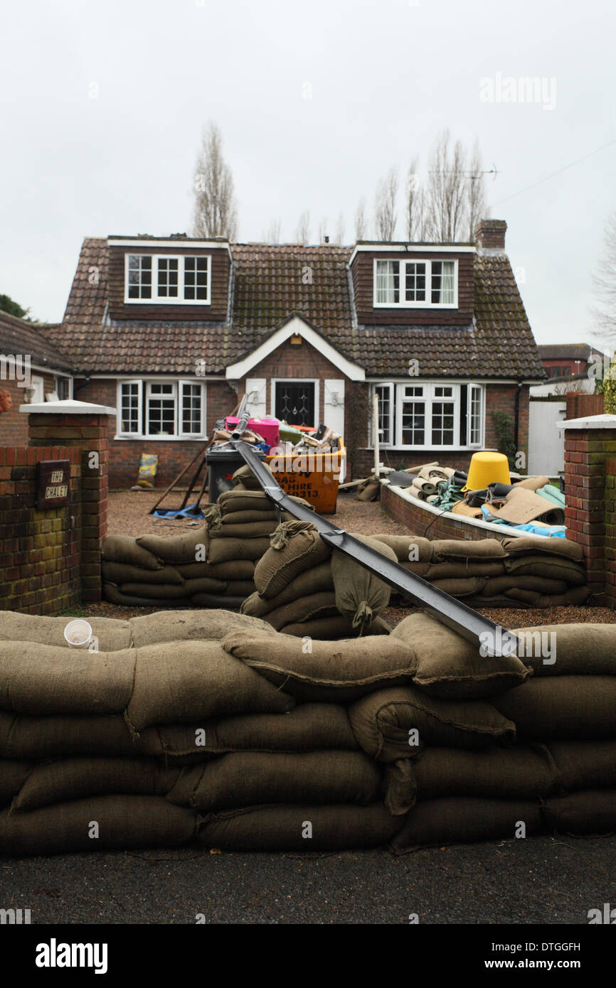 Thames Valley, UK. 17th Feb, 2014. Sand bags and water pump flood defences on Ham Island. Flood waters remain high after last weeks flooding across the Thames valley. Credit:  Zute Lightfoot/Alamy Live News Stock Photo