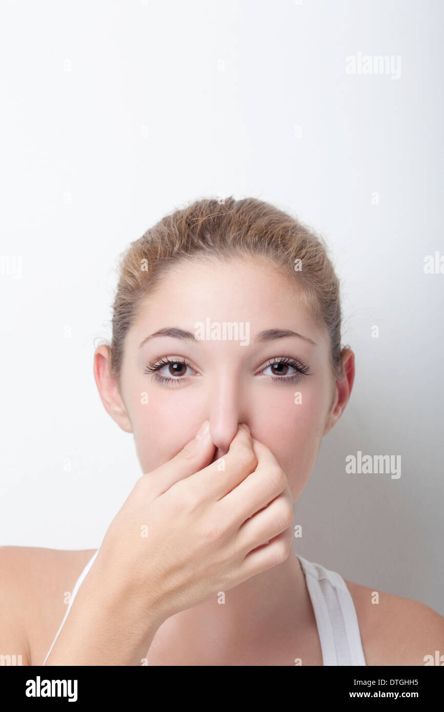 Girl hold nose hires stock photography and images Alamy