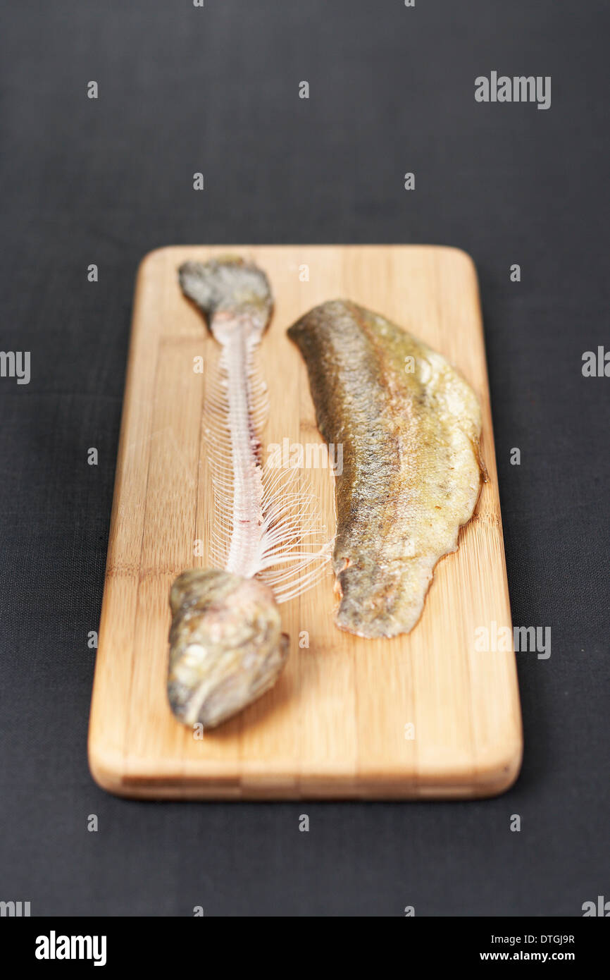 Filleting a trout Stock Photo Alamy