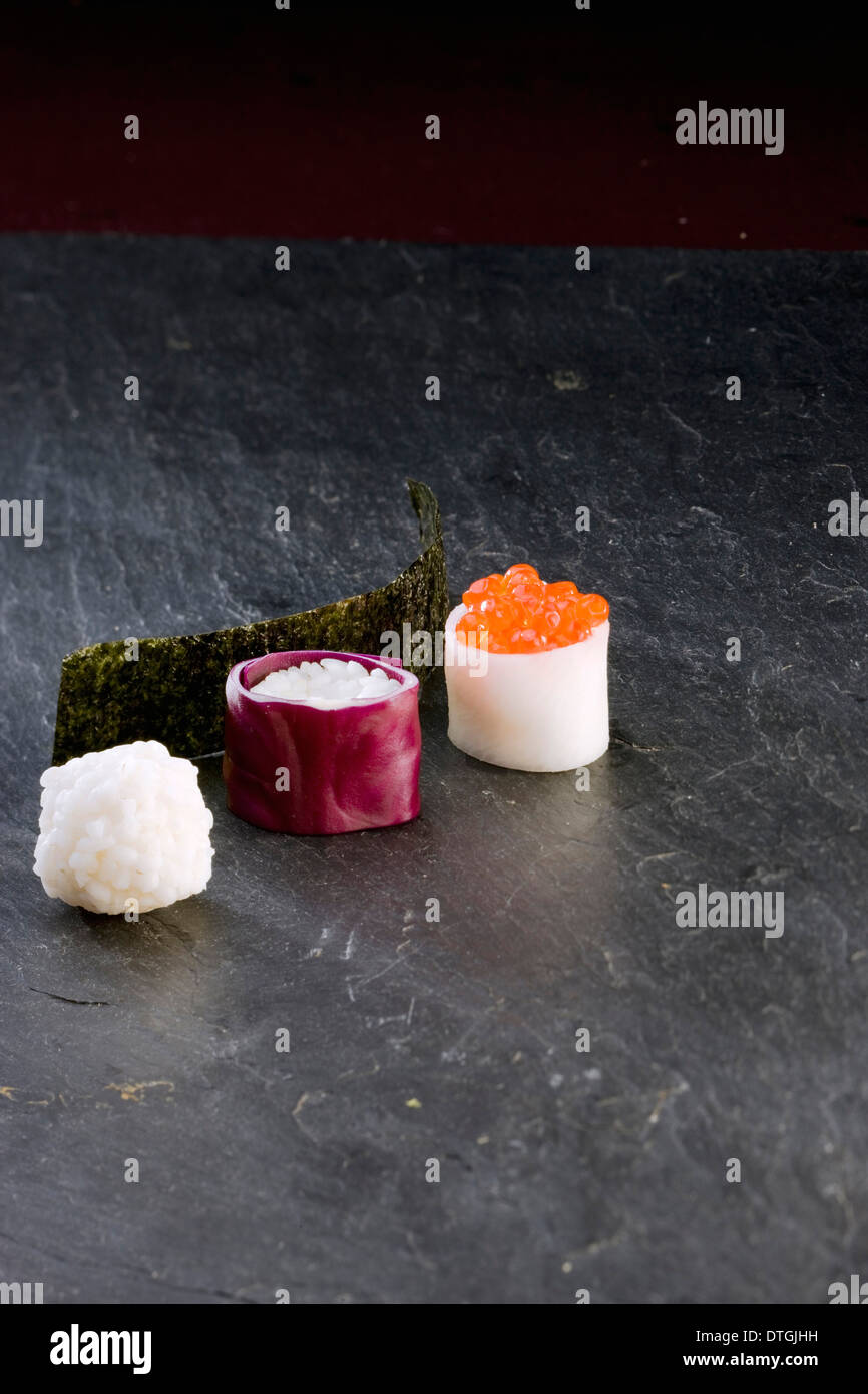 Red cabbage makis and palm heart and fish roe makis Stock Photo