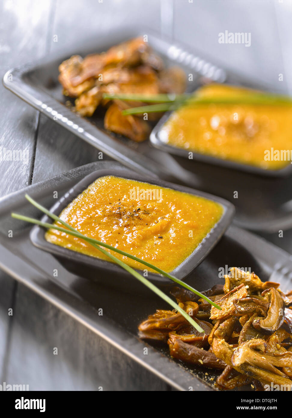Pumpkin puree with pan-fried ceps Stock Photo
