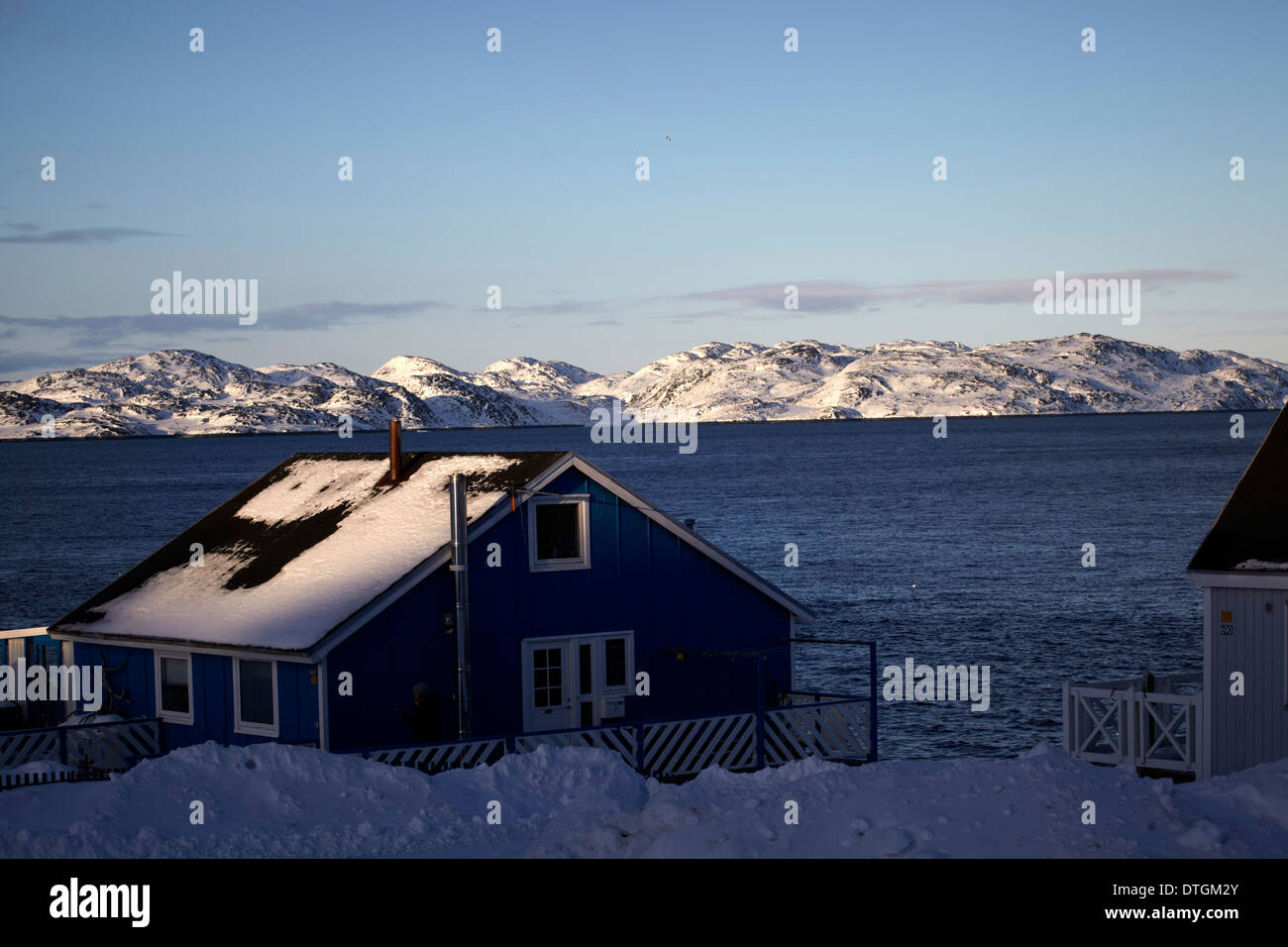 Greenland. House and mountain. View from Nuuk. A cross the fjord we can see the small mountain Stock Photo
