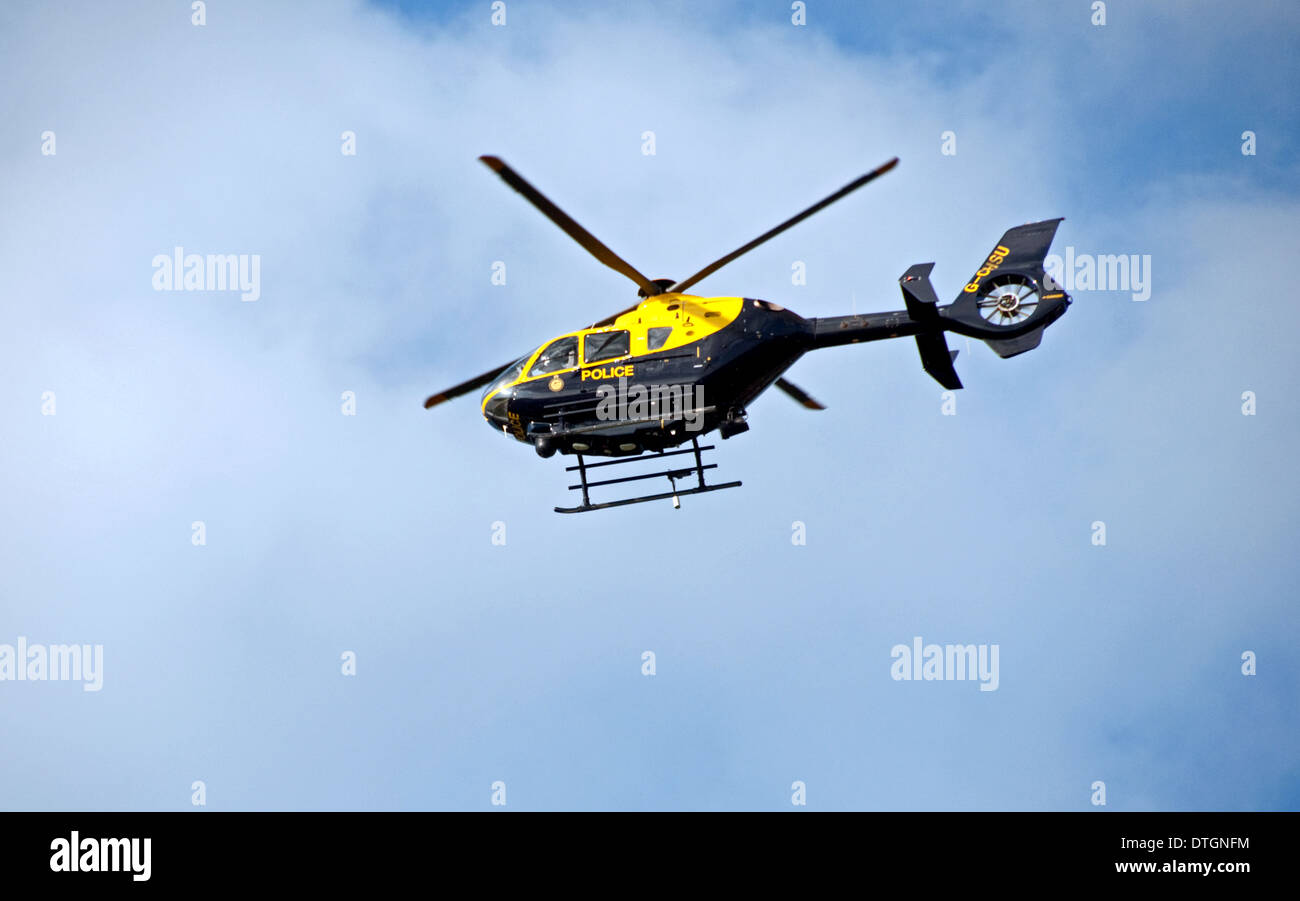 Police Helicopter in Flight Stock Photo