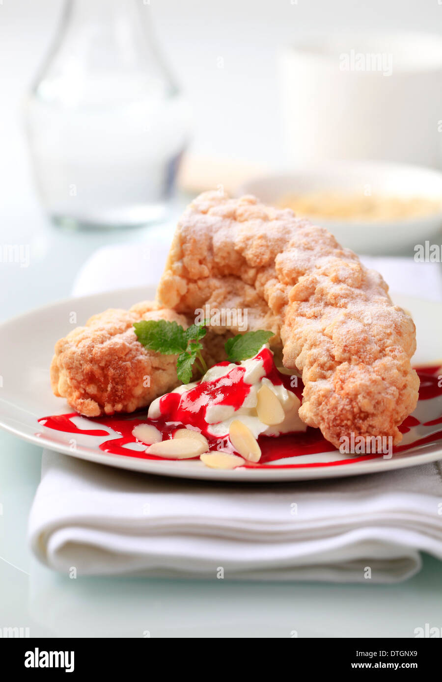 Sweet bread rolls with cream cheese and syrup Stock Photo