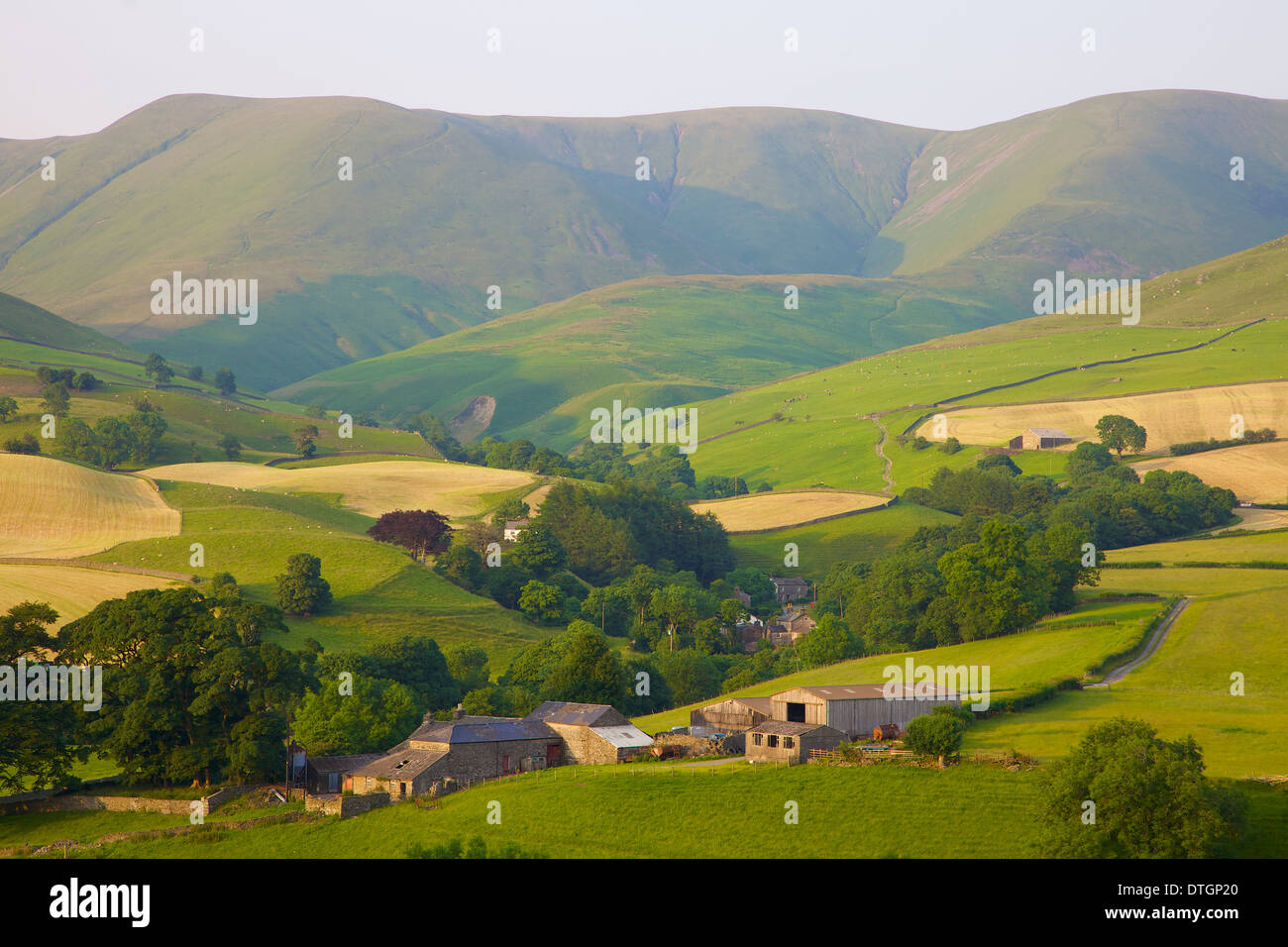 Pastoral Scene Of Hill Farms Below The Howgill Fells Yorkshire Dales 