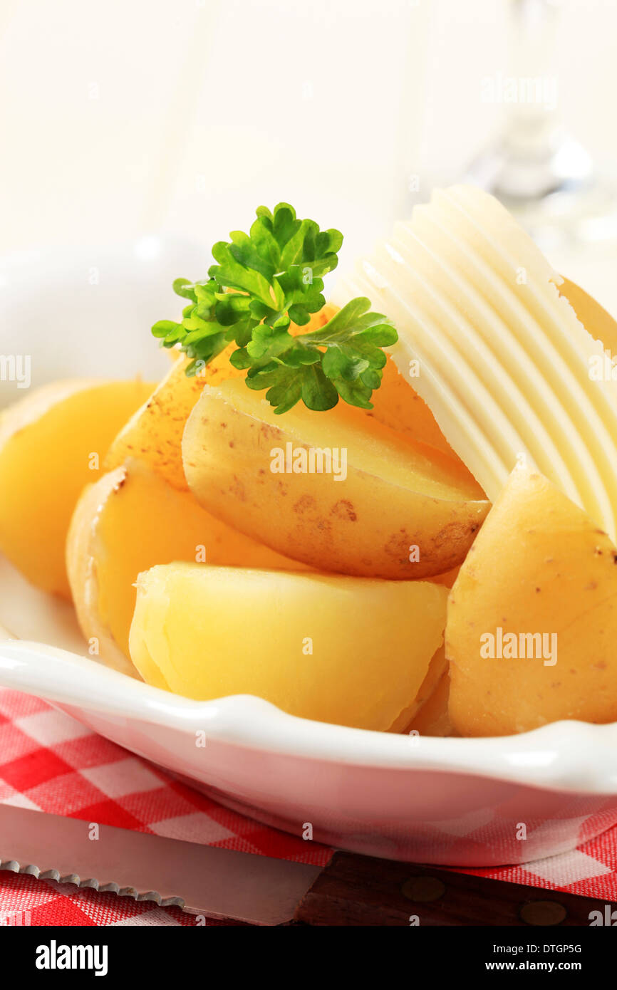 Bowl of potatoes boiled with skin on Stock Photo Alamy