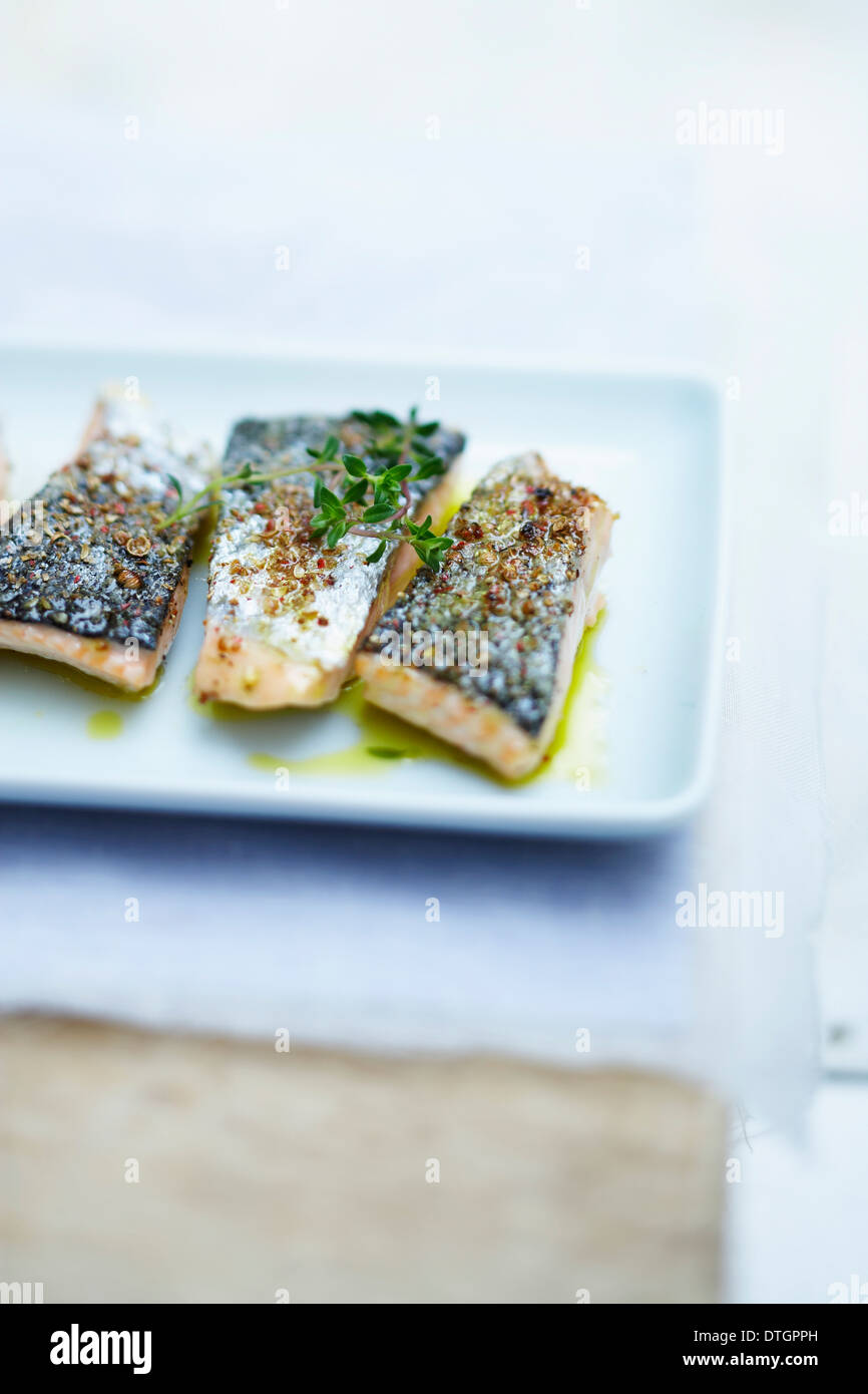 Salmon grilled on one side,lemon-thyme sauce Stock Photo