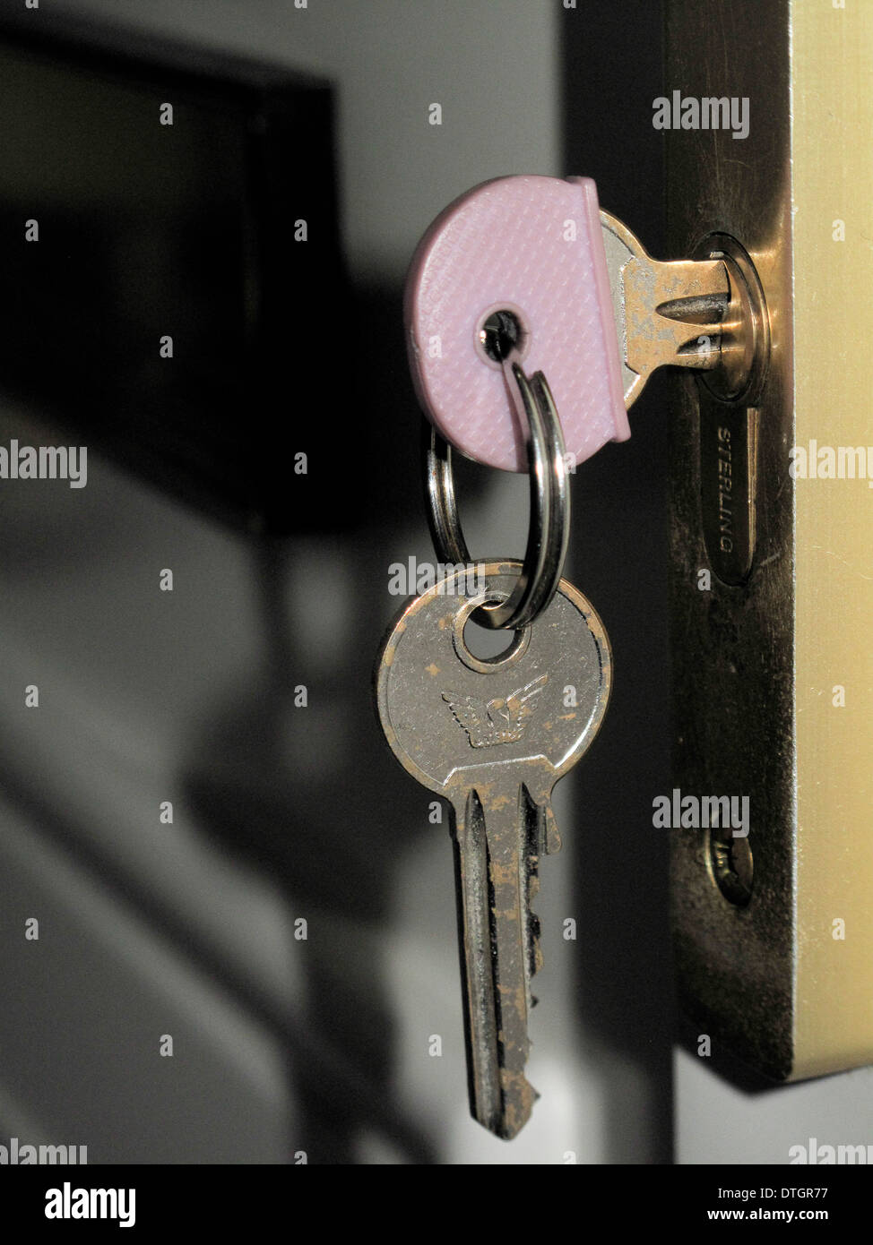 House keys in inside front door lock Stock Photo Alamy