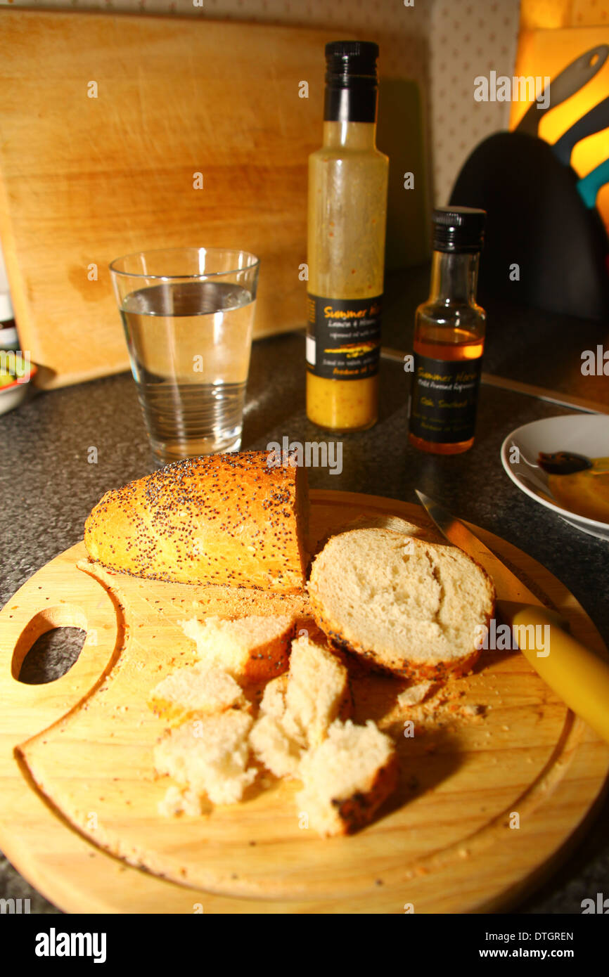 Crusty sesame bread with oils and vinegars Stock Photo Alamy