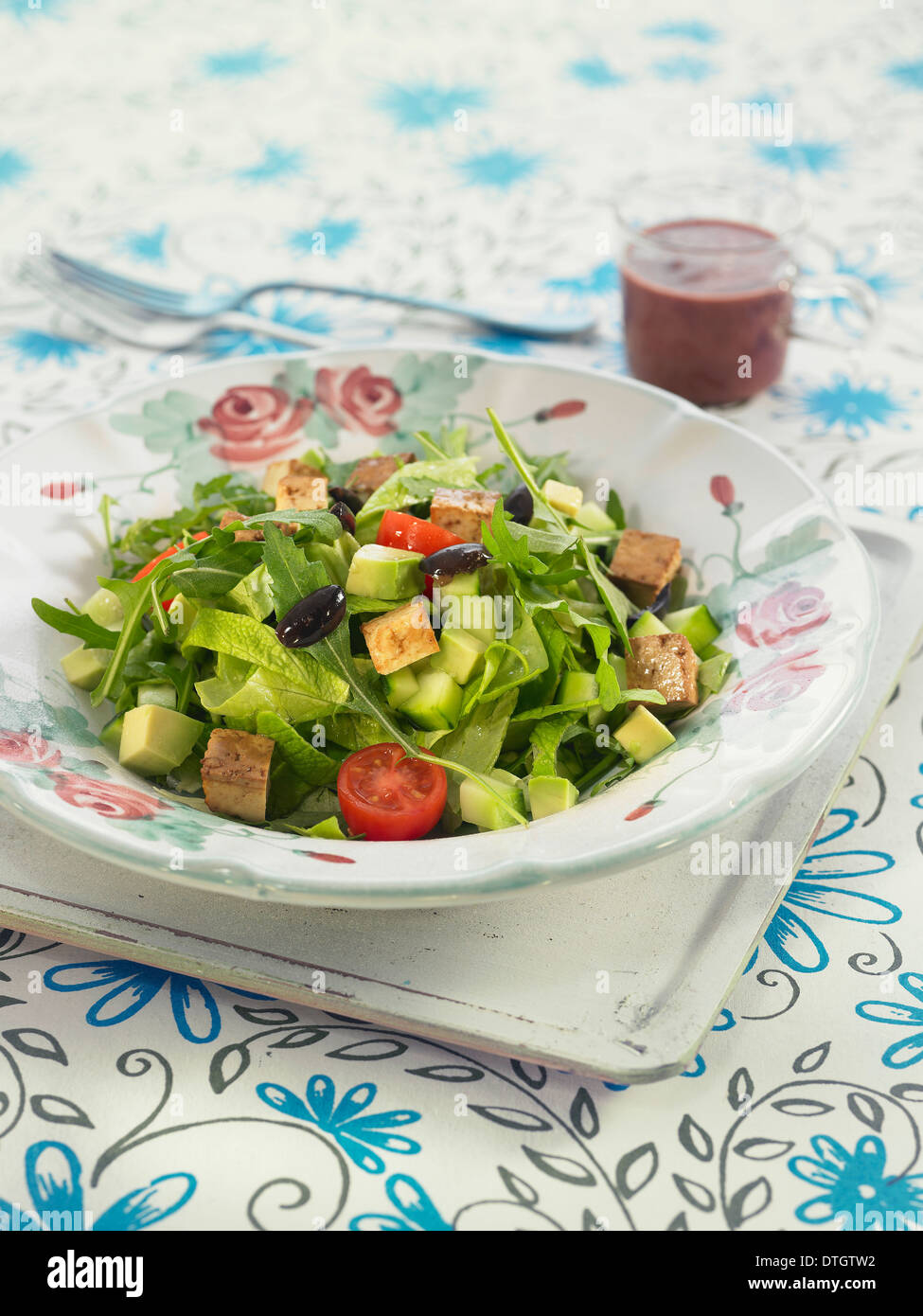 Lettuce,seitan, tomato and olive salad with beetroot salad Stock Photo