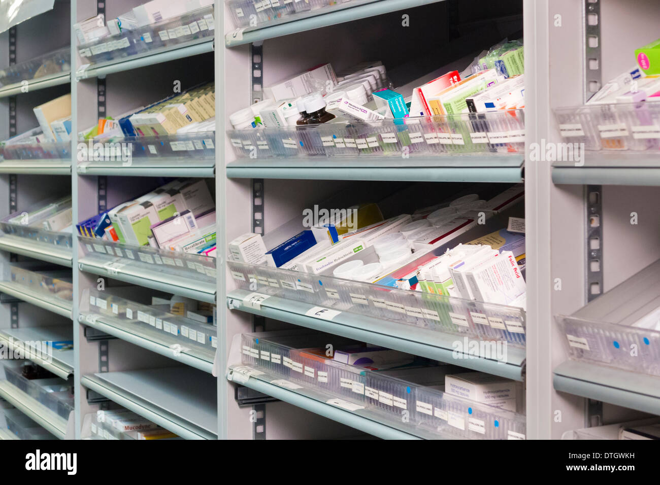 Medicines on shelves at a UK pharmacy Stock Photo