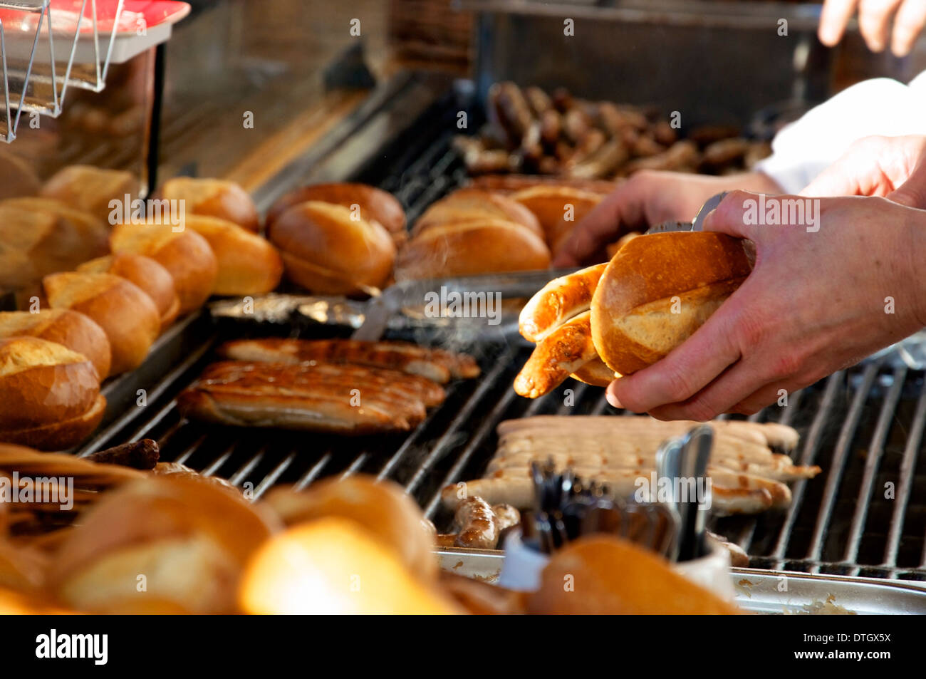 Fried Sausages (Bratwurst) being sold in a vending Stall in Germany. Stock Photo
