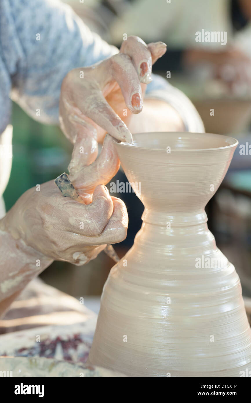 Hands molding a piece of pottery Stock Photo Alamy