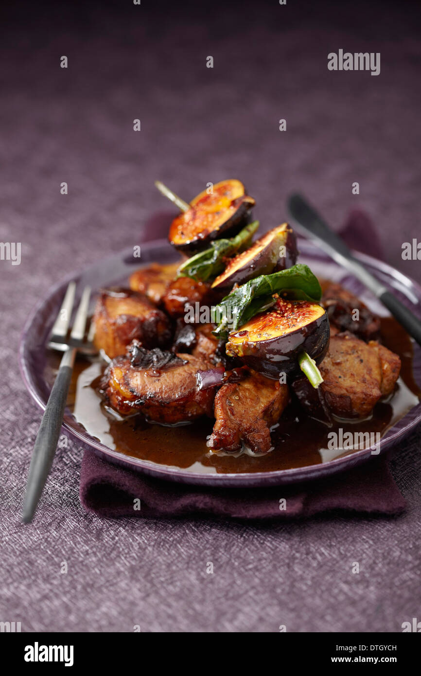 Pork filet mignon with fig brochettes Stock Photo Alamy